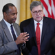 Housing and Urban Development Secretary Ben Carson (L) and Attorney General William Barr attend a First Step Act celebration in the East Room of the White House April 01, 2019 in Washington, DC.